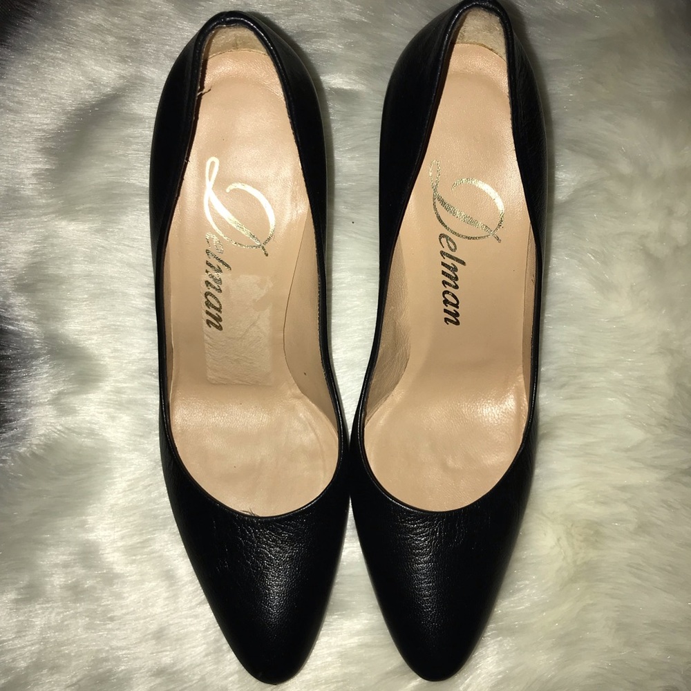 Delman black leather pumps